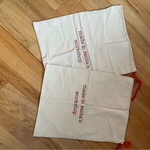 Bundle of 2 new Santa’s workshop canvas drawings sacs bags